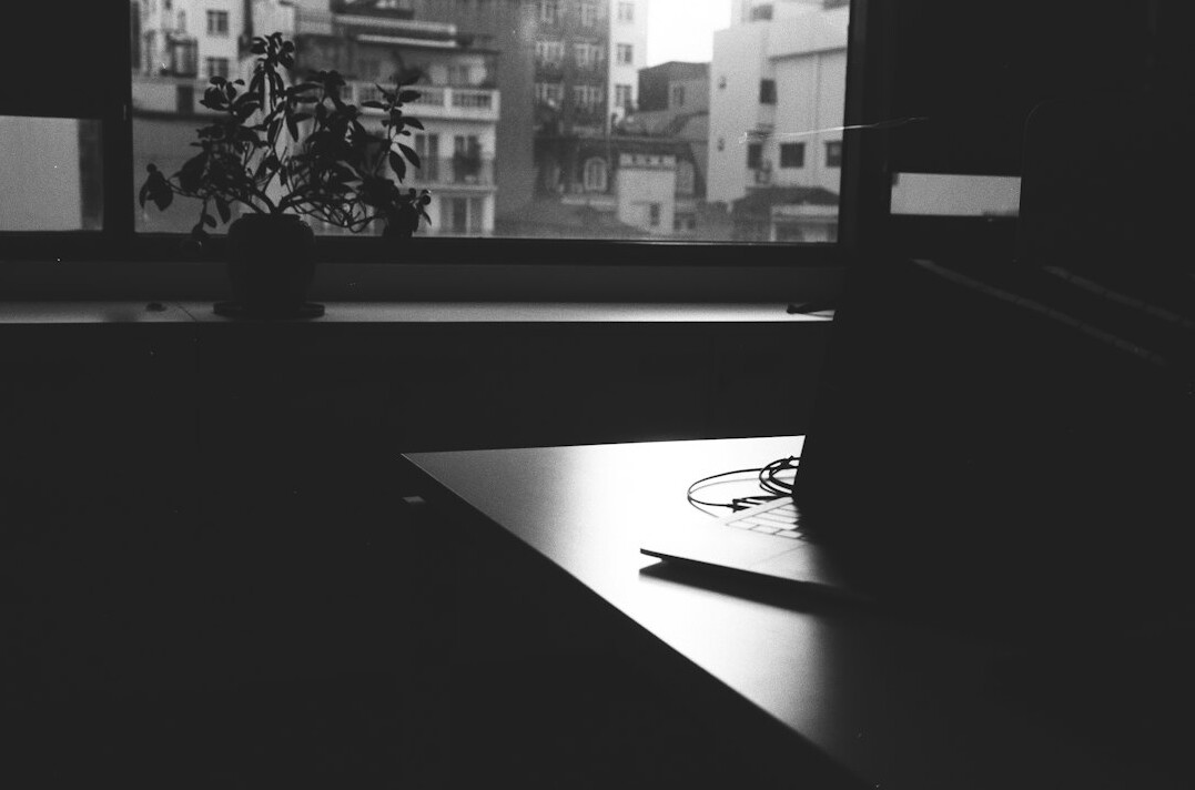 mysterious writer at desk
